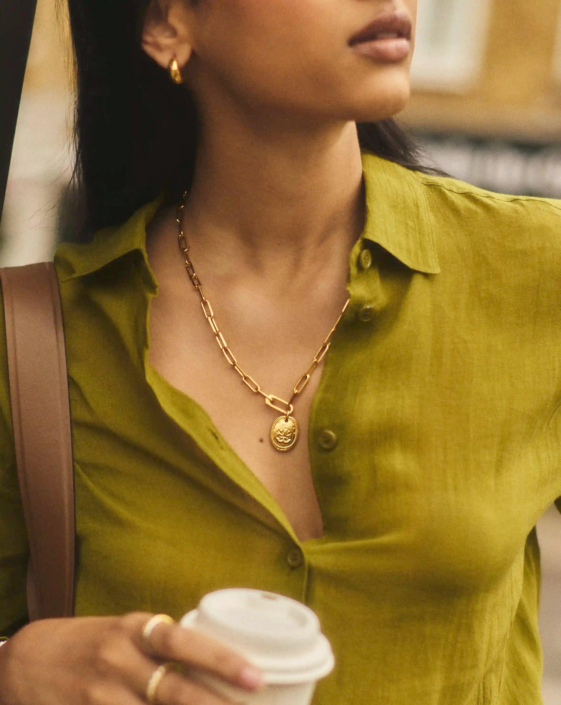 The Friendship Talisman Pendant worn by a customer